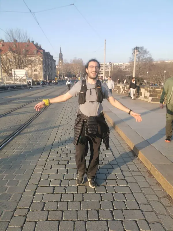 Crossing the Augustusbrücke in Dresden, the old town behind.