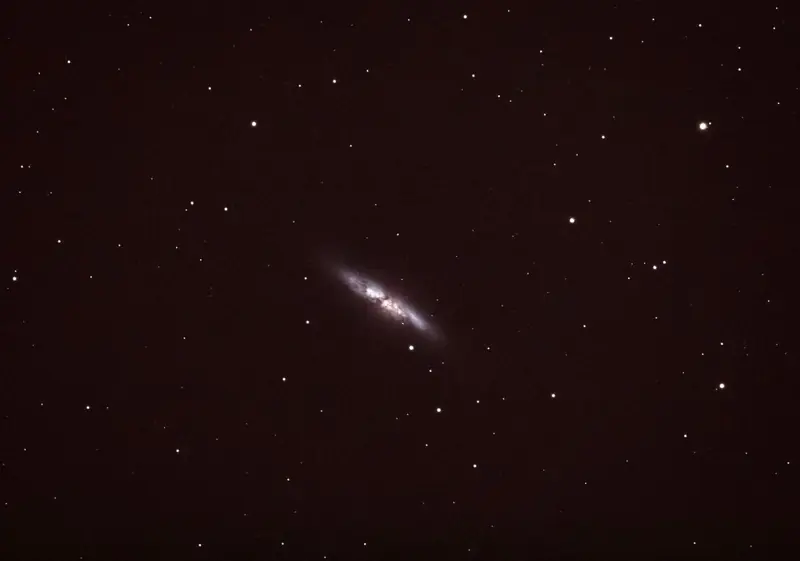 M82, the Cigar Galaxy — an edge-on starburst galaxy in Ursa Major, some 12 million light years away.