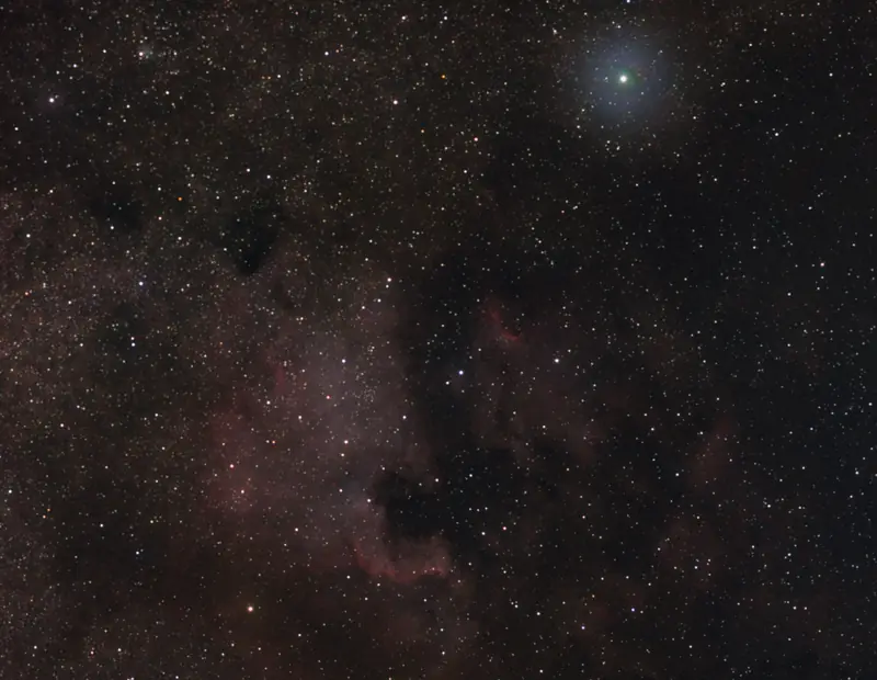 The North America Nebula (NGC 7000) in Cygnus, with the bright star Deneb at upper right.